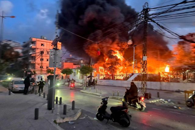 A blaze sweeps following Israeli bombardment on a solar farm and electricity generation facility in Lebanon's southern coastal city of Tyre on March 4, 2026. Israeli forces on March 4 advanced into a number of towns and villages in south Lebanon, a source from the UN peacekeeping force in the country, UNIFIL, told AFP. (Photo by KAWANT HAJU / AFP)