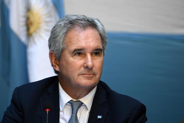 Argentina's Foreign Minister Pablo Quirno attends a press conference with Argentine Gendarmerie officer Nahuel Agustin Gallo (out of frame) at the headquarters of the Argentine National Gendarmerie Command in Buenos Aires on March 4, 2026. Gallo, who had been imprisoned in Venezuela since December 2024, was released from Rodeo I, a feared political prison on the outskirts of Caracas. (Photo by Luis ROBAYO / AFP)