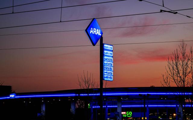 A photo shows an illuminated display showing the prices at an Aral gas station in Bochum on March 4, 2026. Oil prices are expected to rise after traffic through the Strait of Hormuz has almost entirely halted following Iran's threat to attack ships that would try to sail through. (Photo by Ina FASSBENDER / AFP)