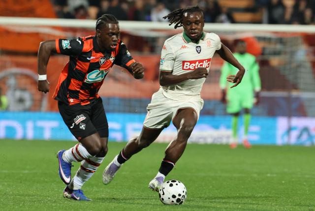 Lorient's French midfielder #17 Jean-Victor Makengo fights for the ball with Nice's French defender #44 Amidou Doumbouya during the French Cup quarter final football match between FC Lorient and OGC Nice at the Stade du Moustoir stadium in Lorient, western France on March 4, 2026. (Photo by Fred TANNEAU / AFP)
