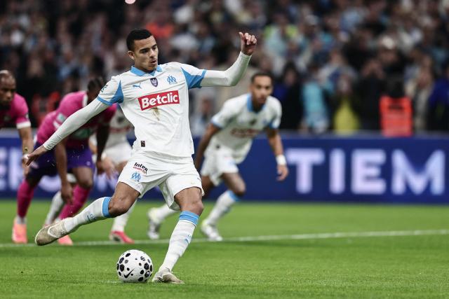 Marseille's English forward #10 Mason Greenwood kicks the ball to score a penalty during the French Cup quarter final football match between Olympique de Marseille (OM) and Toulouse FC at the Stade Velodrome stadium in Marseille, southern France on March 4, 2026. (Photo by Thibaud MORITZ / AFP)