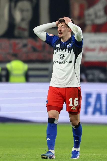 Hamburg's Georgian defender #16 Giorgi Gocholeishvili reacts during the German first division Bundesliga football match between Hamburger SV and Bayer 04 Leverkusen in Hamburg, northern Germany on March 4, 2026. (Photo by IBRAHIM OT / AFP) / DFL REGULATIONS PROHIBIT ANY USE OF PHOTOGRAPHS AS IMAGE SEQUENCES AND/OR QUASI-VIDEO