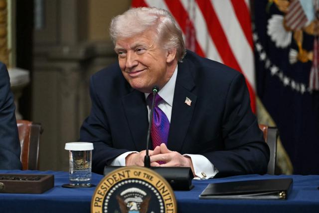 US President Donald Trump smiless during a roundtable on Ratepayer Protection Pledge in the Indian Treaty Room at the Eisenhower Executive Office Building on the White House campus in Washington, DC, on March 4, 2026. (Photo by ANDREW CABALLERO-REYNOLDS / AFP)