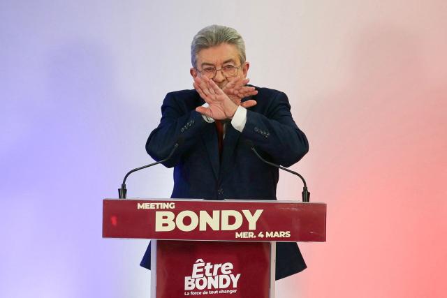 TOPSHOT - Leader of French left-wing La France Insoumise (LFI) party Jean-Luc Melenchon gestures as he addresses supporters during a campaign rally to support Bondy's LFI mayoral candidate ahead of France's upcoming municipal elections in Bondy in Seine-Saint-Denis on March 4, 2026. French voters head to the polls for municipal elections on March 15 and 22, 2026. (Photo by Dimitar DILKOFF / AFP)