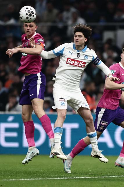 Toulouse's Danish defender #02 Rasmus Nicolaisen fights for the ball during the French Cup quarter final football match between Olympique de Marseille (OM) and Toulouse FC at the Stade Velodrome stadium in Marseille, southern France on March 4, 2026. (Photo by Thibaud MORITZ / AFP)