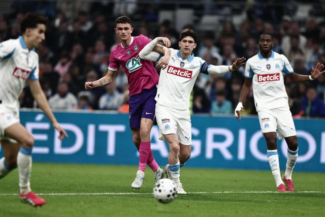 Toulouse's Danish defender #02 Rasmus Nicolaisen fights for the ball during the French Cup quarter final football match between Olympique de Marseille (OM) and Toulouse FC at the Stade Velodrome stadium in Marseille, southern France on March 4, 2026. (Photo by Thibaud MORITZ / AFP)