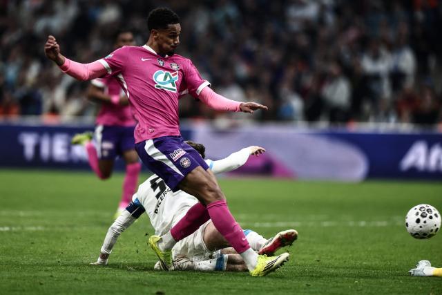 Toulouse's Brazilian forward #20 Emersonn fights for the ball during the French Cup quarter final football match between Olympique de Marseille (OM) and Toulouse FC at the Stade Velodrome stadium in Marseille, southern France on March 4, 2026. (Photo by Thibaud MORITZ / AFP)