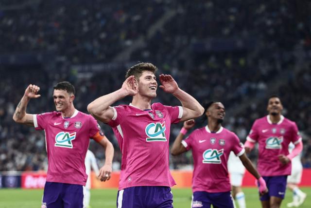 Toulouse's English defender #04 Charlie Cresswell celebrates after scoring a goal during the French Cup quarter final football match between Olympique de Marseille (OM) and Toulouse FC at the Stade Velodrome stadium in Marseille, southern France on March 4, 2026. (Photo by Thibaud MORITZ / AFP)
