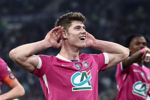 Toulouse's English defender #04 Charlie Cresswell celebrates after scoring a goal during the French Cup quarter final football match between Olympique de Marseille (OM) and Toulouse FC at the Stade Velodrome stadium in Marseille, southern France on March 4, 2026. (Photo by Thibaud MORITZ / AFP)