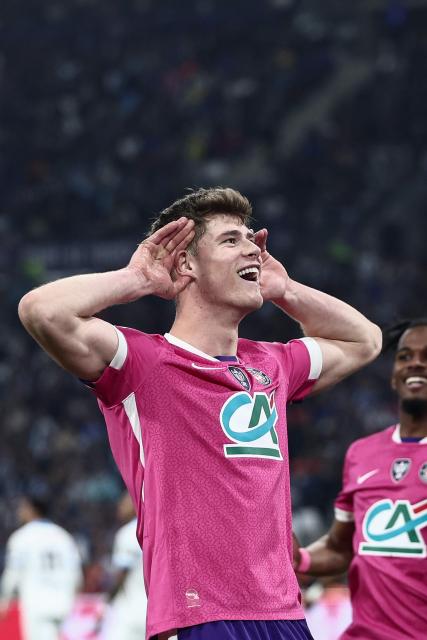 Toulouse's English defender #04 Charlie Cresswell celebrates after scoring a goal during the French Cup quarter final football match between Olympique de Marseille (OM) and Toulouse FC at the Stade Velodrome stadium in Marseille, southern France on March 4, 2026. (Photo by Thibaud MORITZ / AFP)