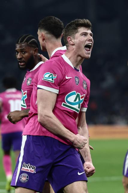Toulouse's English defender #04 Charlie Cresswell celebrates after scoring a goal during the French Cup quarter final football match between Olympique de Marseille (OM) and Toulouse FC at the Stade Velodrome stadium in Marseille, southern France on March 4, 2026. (Photo by Thibaud MORITZ / AFP)