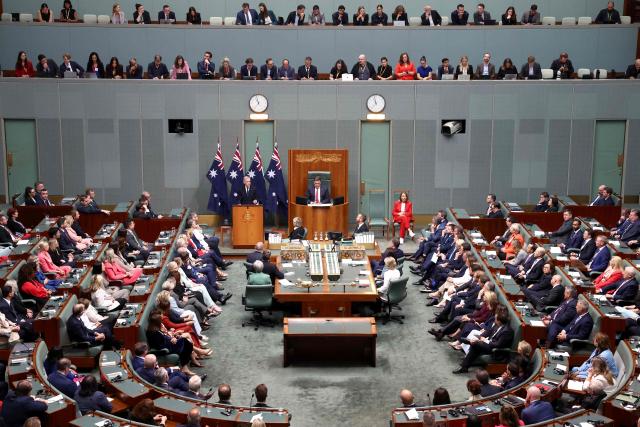 Canadian Prime Minister Mark Carney addresses a parliamentary session in Canberra on March 5, 2026, during his official visit to Australia. (Photo by David GRAY / AFP)