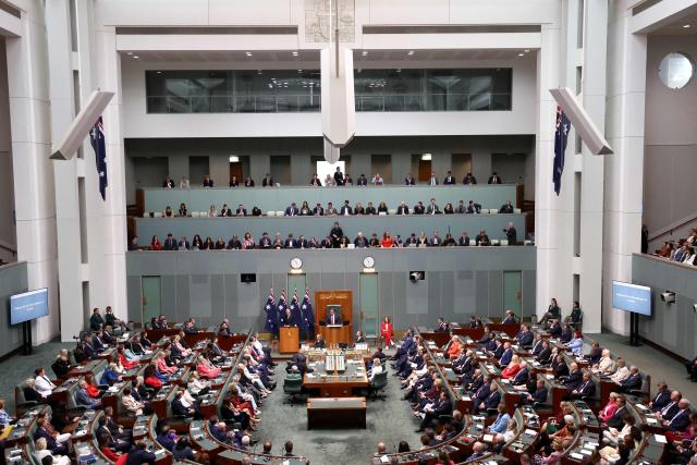 Canadian Prime Minister Mark Carney addresses a parliamentary session in Canberra on March 5, 2026, during his official visit to Australia. (Photo by David GRAY / AFP)