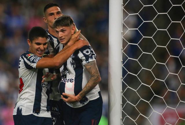 Monterrey's Argentine forward #11 Luca Orellano (R) celebrates with teammates defender #194 Christian Reyes (L) and Montenegrin forward #20 Uros Djurdevic after scoring his team's first goal during the Liga MX Clausura match between Monterrey and Queretaro at BBVA Stadium at Monterrey, Mexico, on March 4, 2026. (Photo by Julio Cesar AGUILAR / AFP)