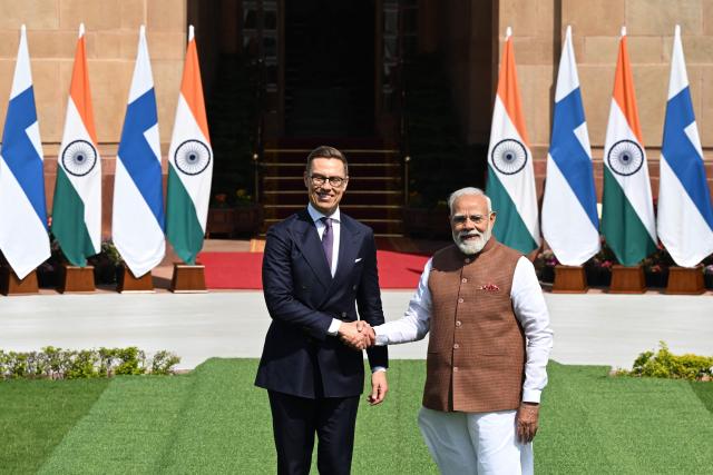 India's Prime Minister Narendra Modi (R) shakes hands with Finland’s President Alexander Stubb (L) before their meeting at the Hyderabad House in New Delhi on March 5, 2026. (Photo by Sajjad  HUSSAIN / AFP)