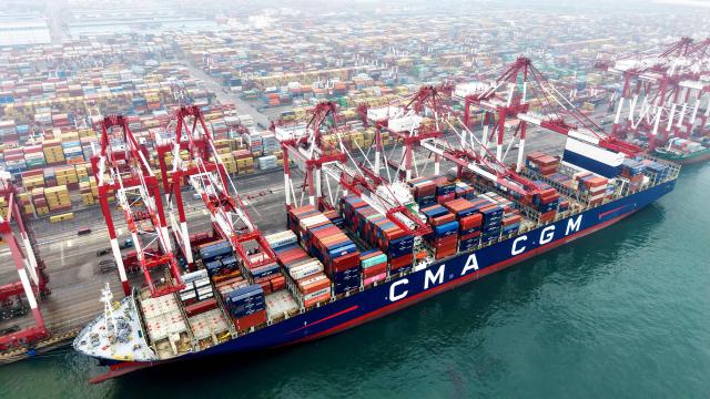 Cargo containers are seen at a port in Qingdao, eastern China's Shandong province on March 5, 2026. (Photo by CN-STR / AFP) / China OUT