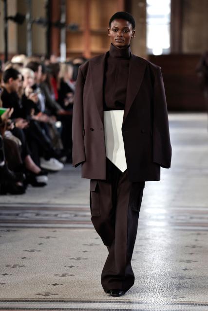 A model presents a creation by Carven for the Women's Ready to Wear Fall/Winter 2026-2027 collection fashion show as part of the Paris Women Fashion Week, in Paris, on March 5, 2026. (Photo by STEPHANE DE SAKUTIN / AFP)