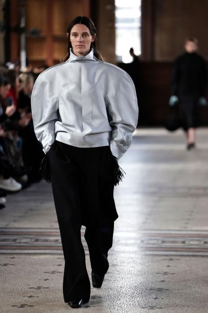 A model presents a creation by Carven for the Women's Ready to Wear Fall/Winter 2026-2027 collection fashion show as part of the Paris Women Fashion Week, in Paris, on March 5, 2026. (Photo by STEPHANE DE SAKUTIN / AFP)