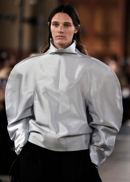 A model presents a creation by Carven for the Women's Ready to Wear Fall/Winter 2026-2027 collection fashion show as part of the Paris Women Fashion Week, in Paris, on March 5, 2026. (Photo by STEPHANE DE SAKUTIN / AFP)