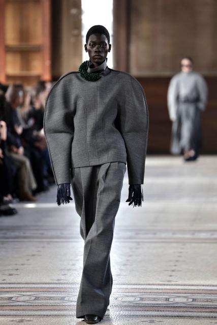 A model presents a creation by Carven for the Women's Ready to Wear Fall/Winter 2026-2027 collection fashion show as part of the Paris Women Fashion Week, in Paris, on March 5, 2026. (Photo by STEPHANE DE SAKUTIN / AFP)