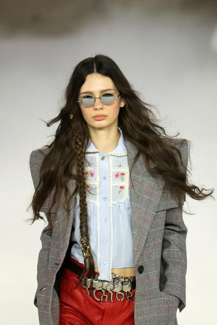 A model presents a creation by Chloe for the Women's Ready to Wear Fall/Winter 2026-2027 collection fashion show as part of the Paris Women Fashion Week, in Paris, on March 5, 2026. (Photo by Thomas SAMSON / AFP)