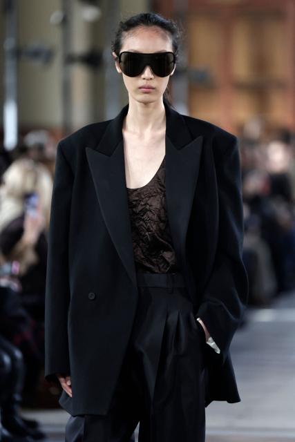 A model presents a creation by Carven for the Women's Ready to Wear Fall/Winter 2026-2027 collection fashion show as part of the Paris Women Fashion Week, in Paris, on March 5, 2026. (Photo by STEPHANE DE SAKUTIN / AFP)