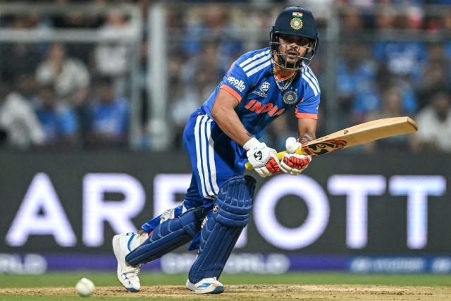 India's Ishan Kishan watches the ball after playing a shot during the 2026 ICC Men's T20 Cricket World Cup semi-final match between India and England at the Wankhede Stadium in Mumbai on March 5, 2026. (Photo by Punit PARANJPE / AFP)