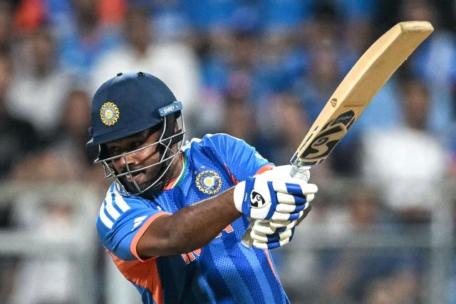 India's Sanju Samson plays a shot during the 2026 ICC Men's T20 Cricket World Cup semi-final match between India and England at the Wankhede Stadium in Mumbai on March 5, 2026. (Photo by Punit PARANJPE / AFP)