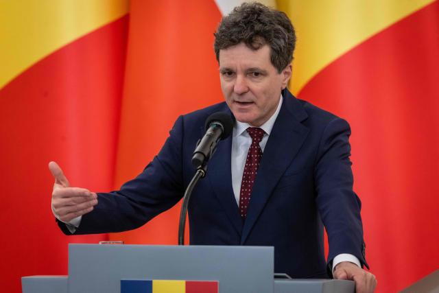 Romania's President Nicusor Dan speaks during a joint press conference with Poland's President after their meeting at the Presidential Palace in Warsaw on March 5, 2026. (Photo by Wojtek RADWANSKI / AFP)