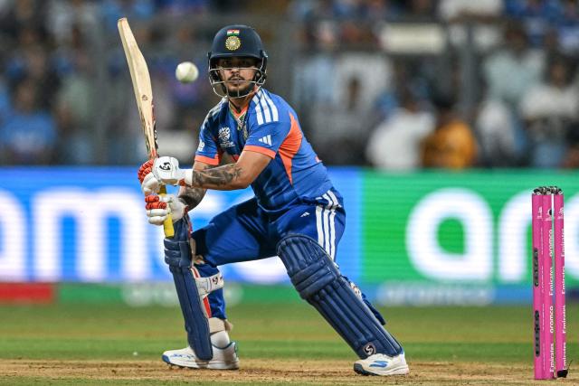 India's Ishan Kishan watches the ball after playing a shot during the 2026 ICC Men's T20 Cricket World Cup semi-final match between India and England at the Wankhede Stadium in Mumbai on March 5, 2026. (Photo by Punit PARANJPE / AFP)