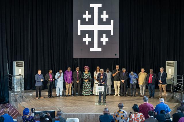 Rwandan Bishop Laurent Mbanda, newly elected leader of the Global Anglican Council, prays at an event in Abuja on March 5, 2026. Members of GAFCON (Global Anglican Future Conference), a conservative wing of the Anglican Church, announced the creation of a Global Anglican Council on March 5, 2026 in Abuja, in response to the appointment of British national Sarah Mullally as the first female Archbishop of Canterbury. (Photo by Light Oriye Tamunotonye / AFP)