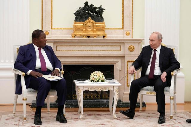 Russian President Vladimir Putin (R) greets Central African Republic President Faustin Archange Touadera at the Kremlin in Moscow on March 5, 2026. (Photo by Alexander Zemlianichenko / POOL / AFP)