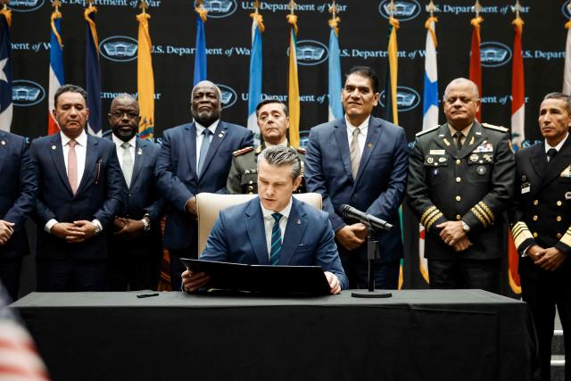 US Secretary of Defense Pete Hegseth reads the Americas Counter Cartel Conference Joint Security Declaration during the inaugural Americas Counter Cartel Conference at the US Southern Command (SOUTHCOM) headquarters in Doral, Florida, on March 5, 2026. Defense and security leaders from across the Caribbean, Central America and South America gathered for the conference to strengthen regional cooperation in combating transnational criminal organizations and narcotics trafficking in the Western Hemisphere. (Photo by Eva Marie UZCATEGUI / AFP)