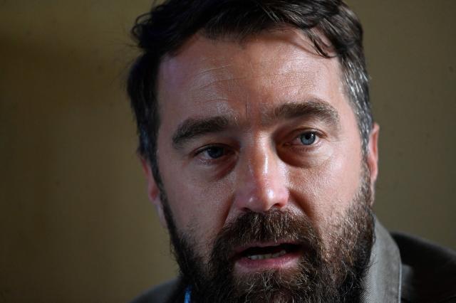 Executive director of the NGO Cristosal, Noah Bullock, speaks during the presentation of the report “The Price of Dissent: Criminalization, Political Persecution in El Salvador (2019–2025)”, in Guatemala City on March 5, 2026. (Photo by JOHAN ORDONEZ / AFP)