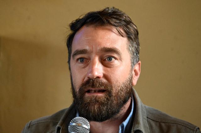 Executive director of the NGO Cristosal, Noah Bullock, speaks during the presentation of the report “The Price of Dissent: Criminalization, Political Persecution in El Salvador (2019–2025)”, in Guatemala City on March 5, 2026. (Photo by JOHAN ORDONEZ / AFP)