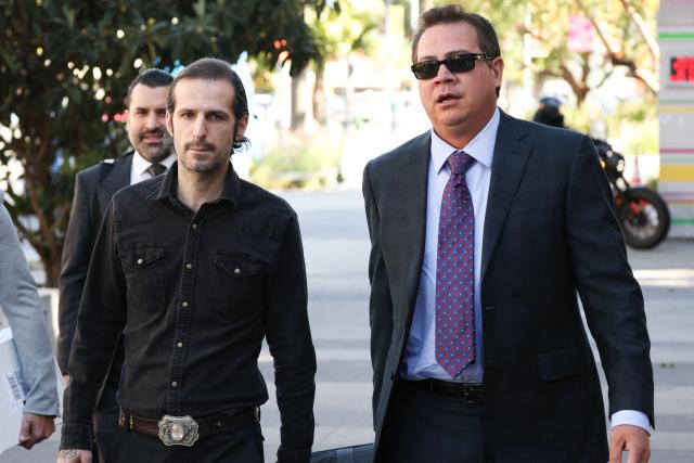 Plaintiff Tony Saxon (L) arrives as US rapper and producer Kanye West and Australian model Bianca Censori are to testify at Los Angeles Superior Court in the civil trial related to his Malibu mansion in Los Angeles, California, on March 5, 2026. West and Censori are testifying in the civil lawsuit filed by contractor Tony Saxon, who was hired in 2021 as a project manager/handyman to renovate the Malibu mansion, alleging unpaid wages, hazardous working conditions and wrongful termination. (Photo by Patrick T. Fallon / AFP)