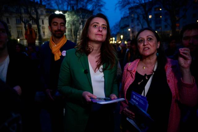 The National secretary of the left-wing party The Ecologistes Marine Tondelier distributes campaign leaflets to support the Mayor of Lyon and candidate for re-election in France's upcoming local elections Gregory Doucet, in Lyon, central eastern France on March 5, 2026. (Photo by Olivier CHASSIGNOLE / AFP)