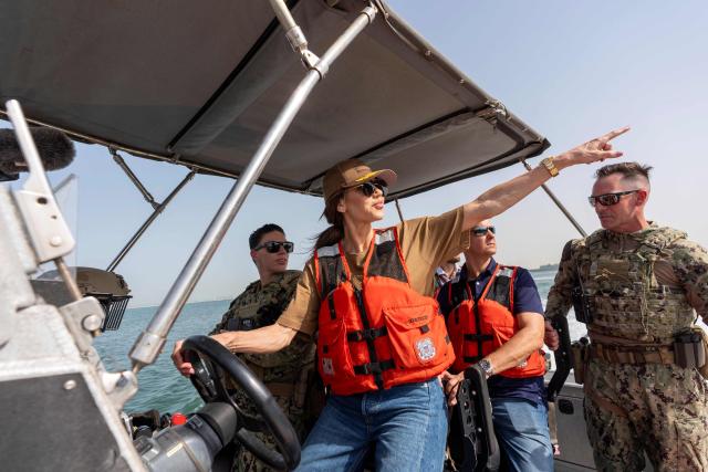 (FILES) US Homeland Security Secretary Kristi Noem (C) pilots an Over the Horizon Small Boat, Mark 4, at Naval Support Activity in Manama on May 25, 2025. US President Donald Trump on March 5, 2026 fired Kristi Noem as head of the Department of Homeland Security, the agency responsible for carrying out his sweeping immigration crackdown. According to multiple media reports, Trump was upset with Noem's testimony at a Senate hearing this week where she said the president had approved a $220 million DHS advertising campaign in which she featured prominently. (Photo by Alex Brandon / POOL / AFP)
