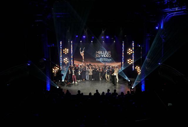 Members of French video game development studio Sandfall Interactive stand on stage as they accept the Best Video Game award for "Clair Obscur: Expedition 33" by French video game development studio Sandfall Interactive during the 7th edition of the Pegases video game awards ceremony at La Cigale in Paris on March 5, 2026. (Photo by Dimitar DILKOFF / AFP)