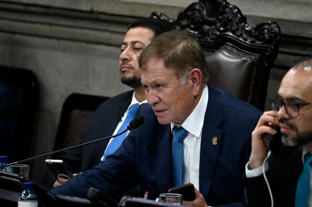 Guatemala's Congress president Luis Contreras (C) speaks during a Congress session for the election of two magistrates for the Constitutional Court in Guatemala City on March 5, 2026. (Photo by JOHAN ORDONEZ / AFP)