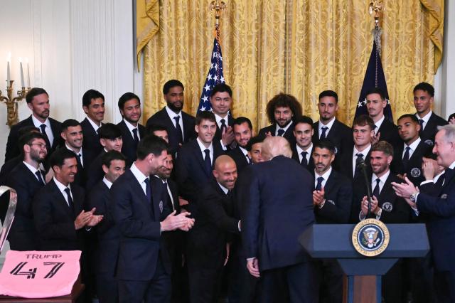 US President Donald Trump shakes hands with coach Javier Mascherano during an event for Inter Miami CF, winners of the 2025 Major League Soccer Cup, in the East Room of the White House in Washington, DC, on March 5, 2026. (Photo by ANDREW CABALLERO-REYNOLDS / AFP)