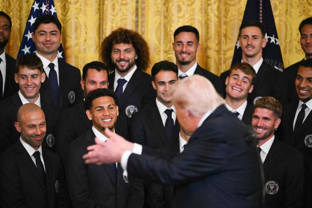 US President Donald Trump applauds Argentinian coach Javier Mascherano (L) during an event for Inter Miami CF, winners of the 2025 Major League Soccer Cup, in the East Room of the White House in Washington, DC, on March 5, 2026. (Photo by ANDREW CABALLERO-REYNOLDS / AFP)