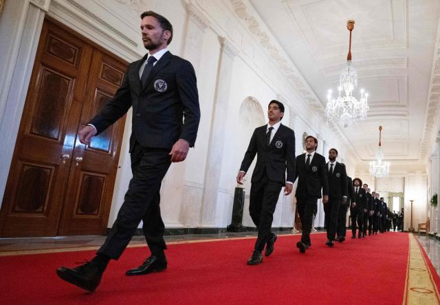 Inter Miami's players arrive for an event honoring them, winners of the 2025 Major League Soccer Cup, in the East Room of the White House in Washington, DC, on March 5, 2026. (Photo by ANDREW CABALLERO-REYNOLDS / AFP)