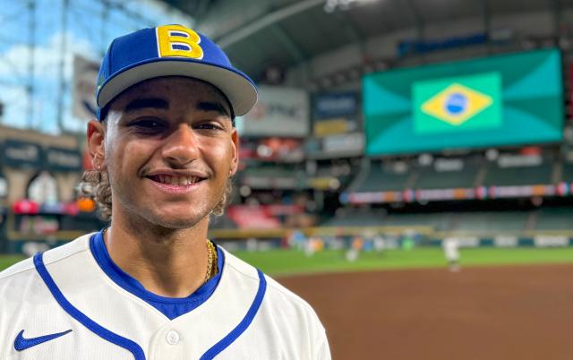 Lucas Ramírez, outfielder from the Brazilian Baseball National Team in the 2026 World Baseball Classic, son of former MLB superstar Manny Ramirez, poses for a photo during practice at the Daikin Stadium in Houston, Texas, on March 5, 2026. Considered as an underdog in this competition but with a Silver Medal at the 2023 Pan American Games, the Team Brazil roster is a mix of Brazilian-born players, Japanese-Brazilian talent, children of MLB players, and athletes developed in the US minor leagues. (Photo by Moisés ÁVILA / AFP)