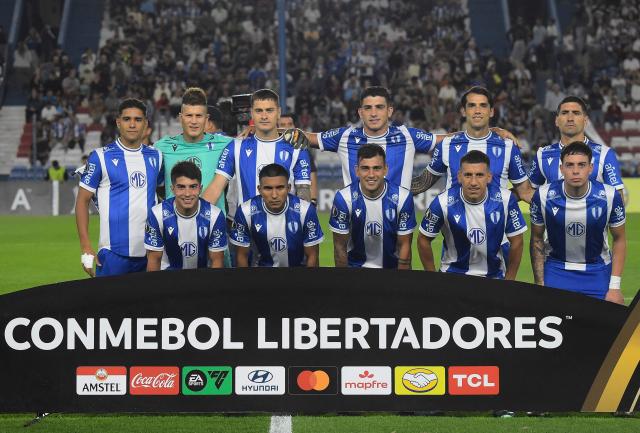 Juventud players pose for a team photo ahead of the Copa Libertadores phase three first-leg football match between Uruguay's Juventud and Colombia's Independiente Medellin at Gran Parque Central Stadium in Montevideo on March 5, 2026. (Photo by Dante Fernandez / AFP)