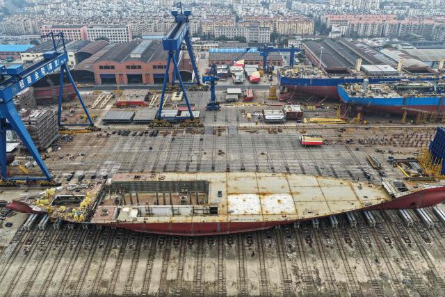 This photo shows a general view of the Jinling Shipyard in Nanjing in China’s eastern Jiangsu province on March 5, 2026. (Photo by CN-STR / AFP) / China OUT