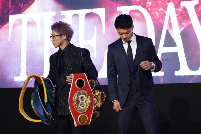 Japanese boxer Naoya Inoue (L), current unified champion of the WBA, WBC, IBF, and WBO world super bantamweight, and his compatriot Junto Nakatani hold a press conference in Tokyo on March 6, 2026. (Photo by Kazuhiro NOGI / AFP)