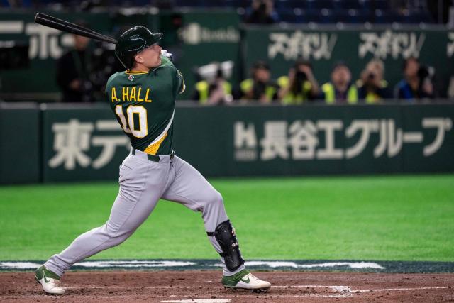 Australia's Alex Hall hits a solo homerun during the World Baseball Classic (WBC) Pool C first round game between Czech Republic and Australia at the Tokyo Dome in Tokyo on March 6, 2026. (Photo by Yuichi YAMAZAKI / AFP)