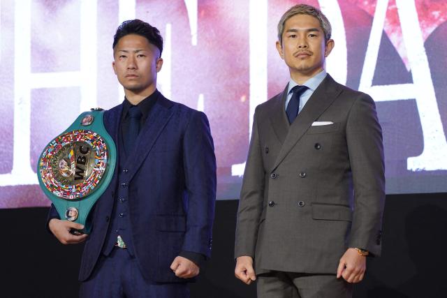WBC bantamweight champion Takuma Inoue (L) and Japanese boxer Kazuto Ioka pose during a photo session at the a press conference in Tokyo on March 6, 2026. Takuma Inoue will defend his WBC bantamweight world title against Kazuto Ioka. (Photo by Kazuhiro NOGI / AFP)