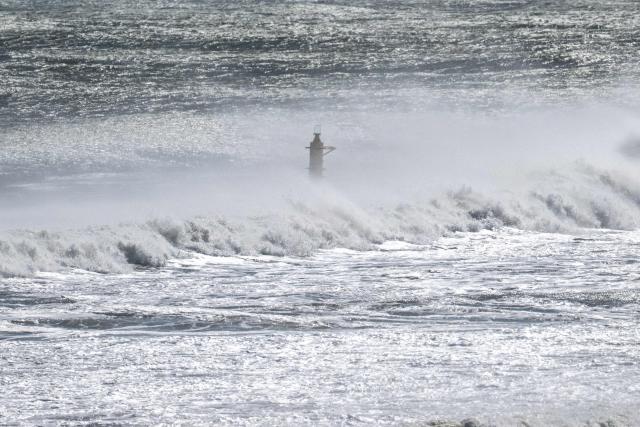 This picture taken on March 5, 2026 shows waves near the Tokyo Electric Power Company's (TEPCO)  Fukushima Daiichi Nuclear Power Plant (not seen in picture), as seen from Ukedo fishing port in Namie, Fukushima prefecture. (Photo by Philip FONG / AFP)